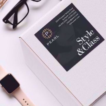 Wholesale full color custom 3.5 inch square stickers Wholesale custom 3.5 inch square stickers next to glasses and watch